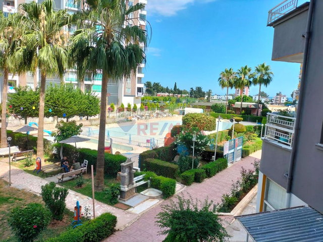 REMAX PALMDEN DENİZ MH.İNCİ SAHİL SİTESİNDE 2+1 EŞYALI SATILIK