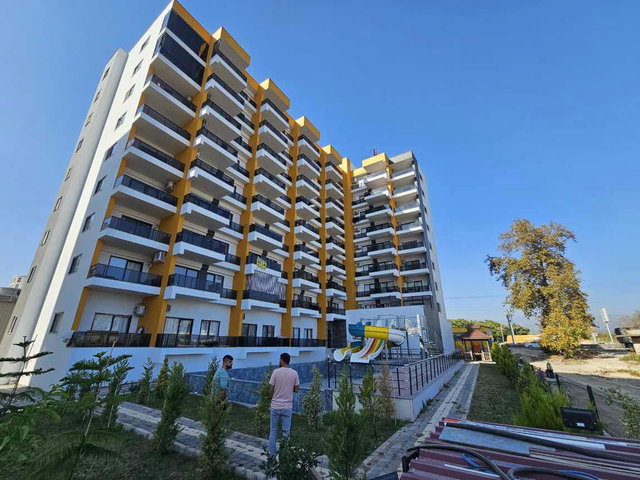 ERDEMLİ TÖMÜK’TE SATILIK 1+1 | BALKONLU, HAVUZLU SİTE | KREDİYE UYGUN
