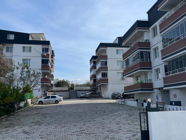 ALIAĞA ÖRNEKKENT'TE ÖZENLE TASARLANMIŞ, OTOPARKLI-GÜVENLİ SITE İÇINDE SATILIK 3+1 DAIRE