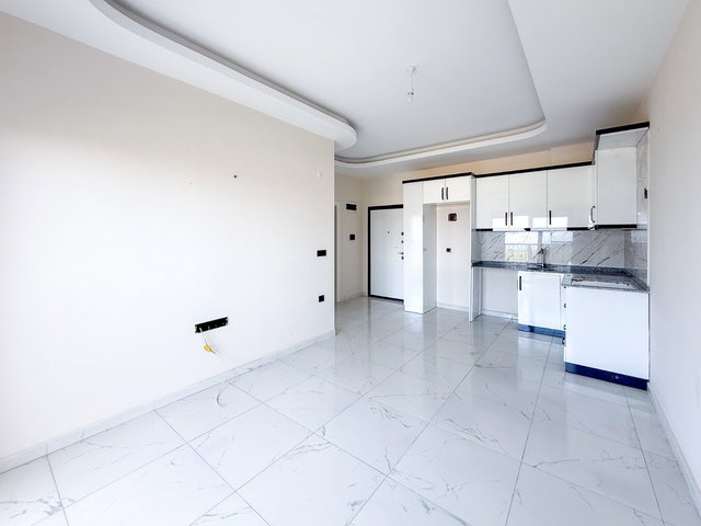 ALANYA DEMIRTAŞTA DENIZE YAKIN DENIZ MANZARALI 1+1 SATILIK DAIRE