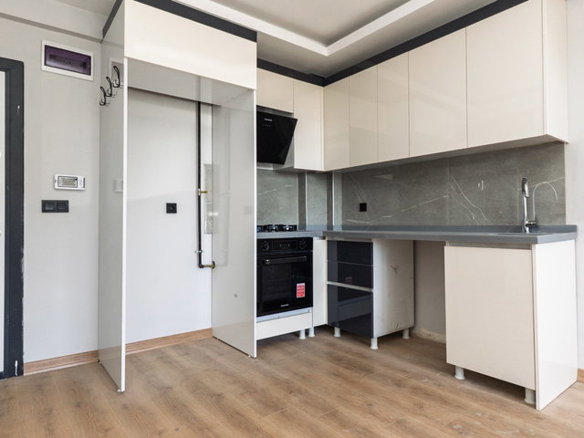 TAŞPINAR MAHALLESİNDE MERKEZİ KONUMDA SATILIK 1+1