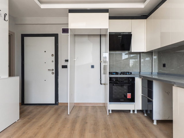 TAŞPINAR MAHALLESİNDE MERKEZİ KONUMDA SATILIK 1+1
