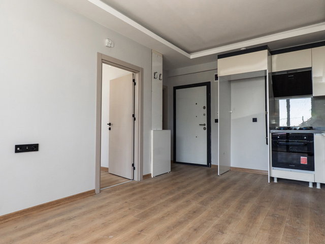 TAŞPINAR MAHALLESİNDE MERKEZİ KONUMDA SATILIK 1+1