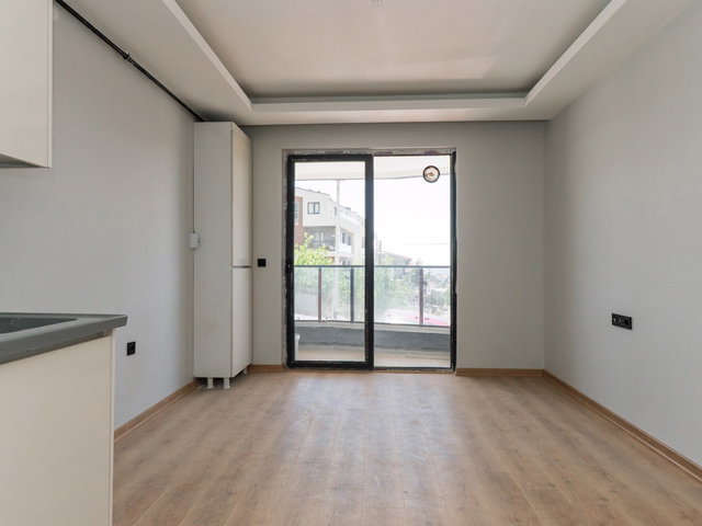 TAŞPINAR MAHALLESİNDE MERKEZİ KONUMDA SATILIK 1+1