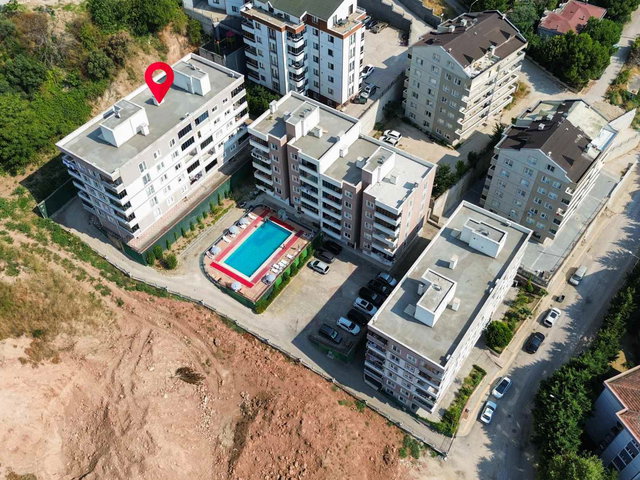 REMAX ADVANTAGE 'TAN  MUDANYA GÜZELYALIDA HASAN EREL SITESINDE SATILIK 2+1 DAIRE