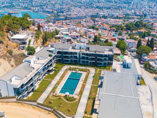 KUŞADASI’NDA SIFIR 2+1 | YERDEN ISITMALI | 2 BANYO | BALKONLU ARAKAT DAİRE