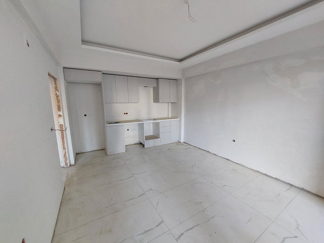 ÇANAKKALE MERKEZ KARACAÖRENDE SOSYAL DONATILI SİTEDE SATILIK 1+1