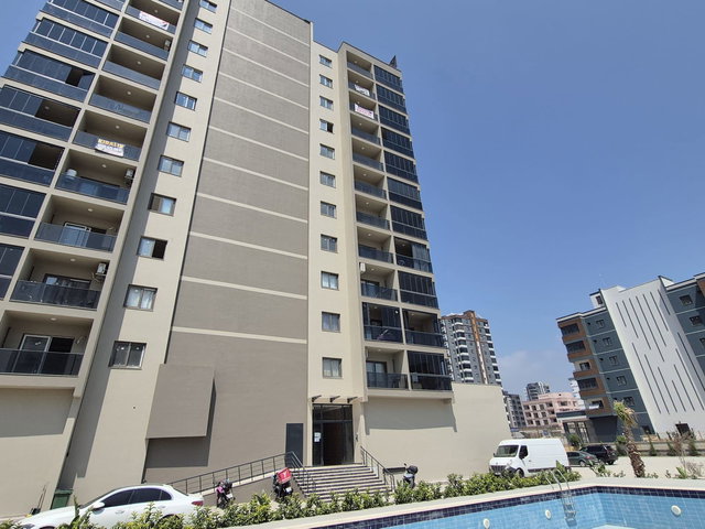REMAX RİNA'DAN KUYULUKTA HAVUZLU SİTE İÇERİSİNDE  1+1