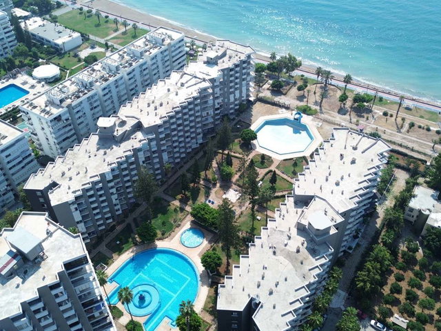 REMAX RİNA'DAN SOLİ SAHİL SİTESİNDE DENİZ MANZARALI 2+1
