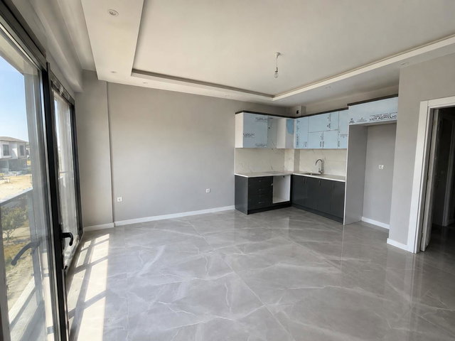 BALIKESIR GÖMEÇ'TE DENIZE 200 METRE DOĞA MANZARALI 2+1 DAIRE