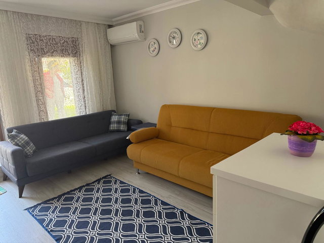 AYVALIK SAHİLKENT EŞYALI KİRALIK 1+1 BAHÇE KATI DAİRE