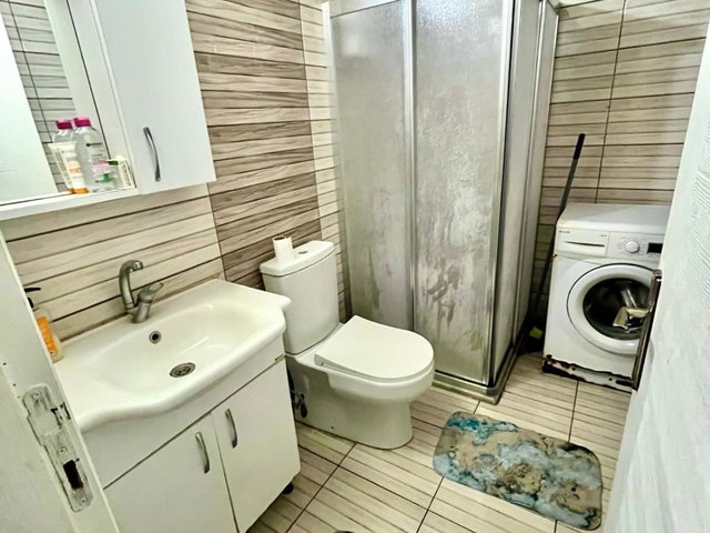 YENİKENT'TE SATILIK 1+1 DAİRE