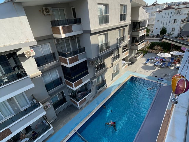 DIDIM EFELER MAHALLESI'NDE HAVUZLU SITE İÇERISINDE 2+1 AYRI MUTFAK DAIRE
