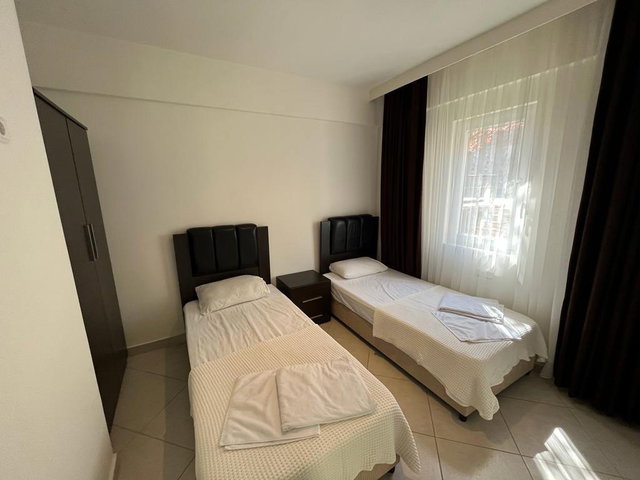 KUŞADASI UNİQUE RESİDENCE 2+1 BAHÇE KATI ÖNÜ AÇIK EŞYALI DAİRE