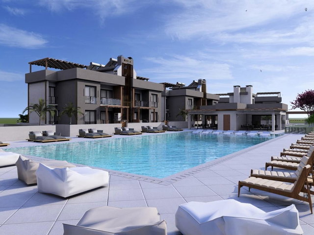 GİRNE LAPTA'DA PLAJA YÜRÜYÜŞ MESAFESİNDE 2+1 DAİRE
