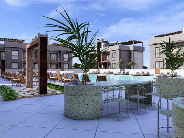 GİRNE LAPTA'DA PLAJA YÜRÜYÜŞ MESAFESİNDE 2+1 DAİRE