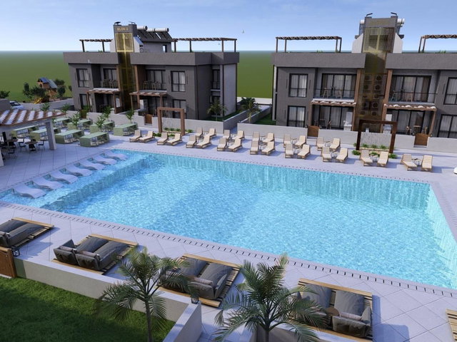 GİRNE LAPTA'DA PLAJA YÜRÜYÜŞ MESAFESİNDE 2+1 DAİRE