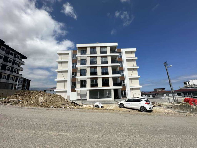REMAX PARLA BARLAS GÜRLER'DEN DENİZ MANZARALI SATILIK 2+1 DAİRE