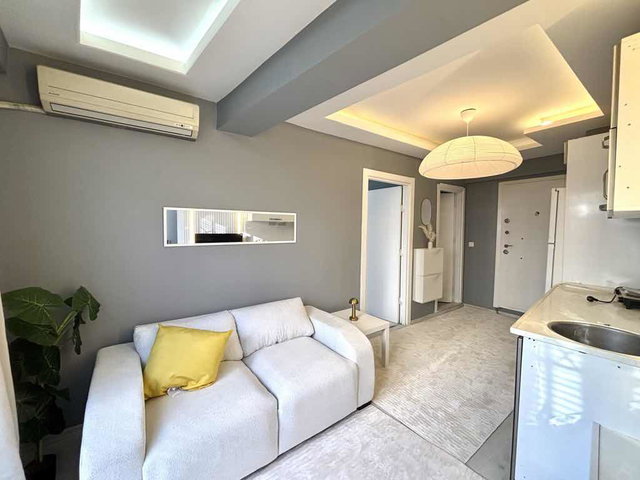 YATIRIM FIRSATI! MERKEZİ KONUMDA KENDİNİ KISA SÜREDE AMORTİ EDEN YÜKSEK KİRA POTANSİYELLİ 2+1 DAİRE