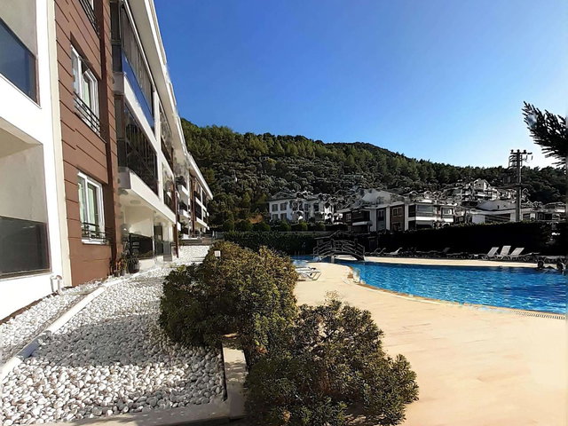 FETHİYE KAYA PARK’TA KONFORLU SİTE YAŞAMI  HAVUZLU KİRALIK 2+1 DAİRE