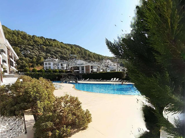 FETHİYE KAYA PARK’TA KONFORLU SİTE YAŞAMI  HAVUZLU KİRALIK 2+1 DAİRE