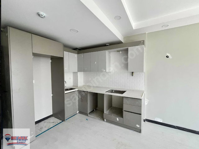 REMAX ŞEHİR AKYOL PREMIUM LOUNGE SATILIK KİRACILI 1+1 DAİRE