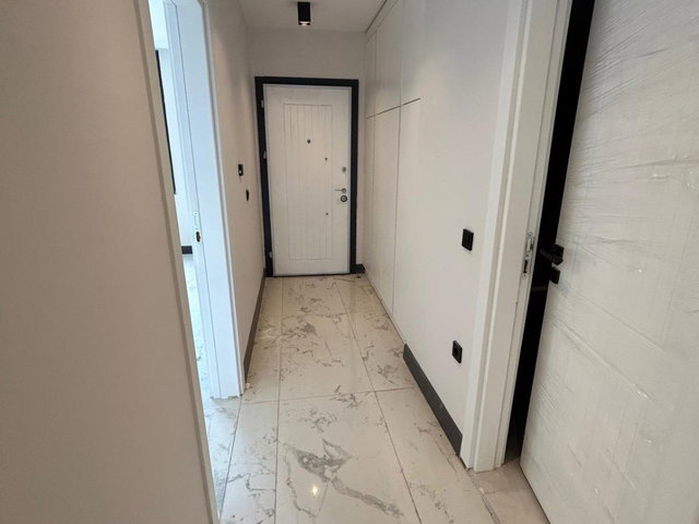 RE/MAX ŞEHİR'DEN HAVUZLU SİTEDE SATILIK BAHÇE DUBLEKS DAİRE