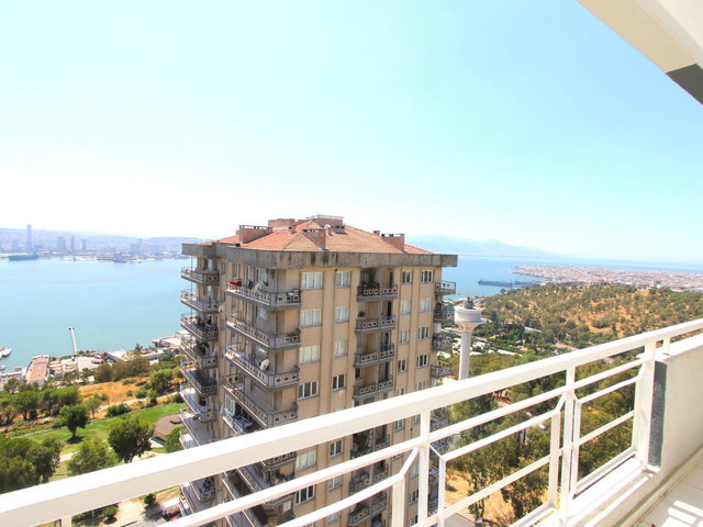 BAYRAKLI YEŞİL SİTEM PANORAMİK DENİZ MANZARALI KIRALIK 3+1 DAİRE