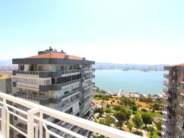 BAYRAKLI YEŞİL SİTEM PANORAMİK DENİZ MANZARALI KIRALIK 3+1 DAİRE