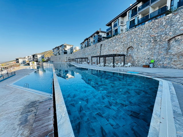 DIDIM AKBÜKTE GÜVENLIKLI HAVUZLU SITEDE FULL DENIZ MANZARALI L BALKONLU FULL EŞYALI DAIRE