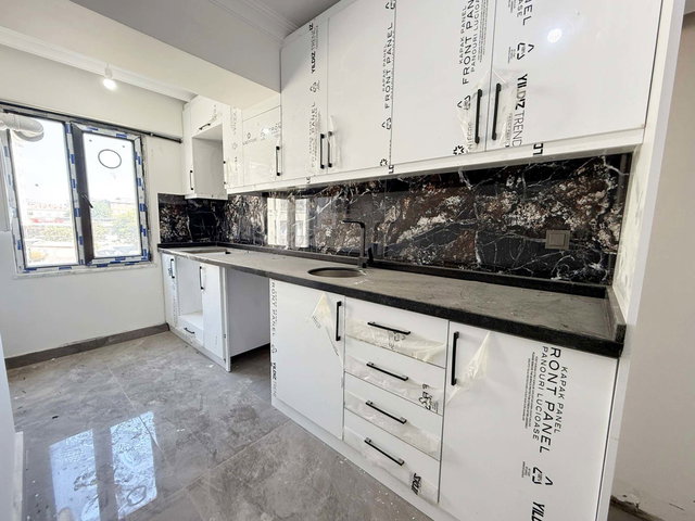 REMAX'TEN KOCASİNAN MERKEZ'DE KAT MÜLKİYETLİ ÖN CEPHE BALKONLU SIFIR SATILIK DAİRE!