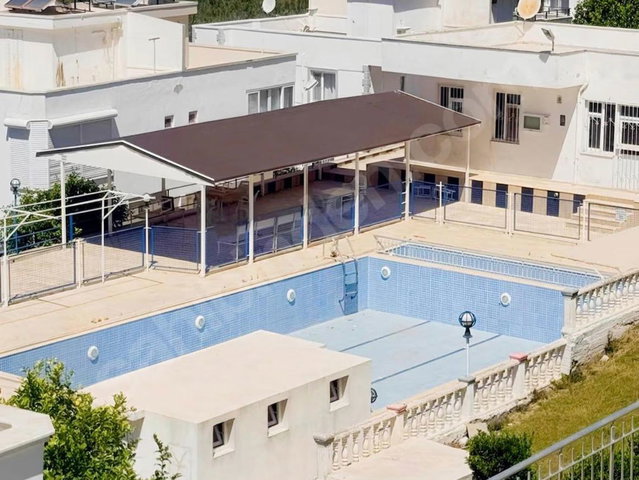 DİDİM MAVİŞEHİR'DE DENİZE 600M MESAFEDE HAVUZLU SİTE İÇERİSİNDE 3+1 SATILIK VİLLA