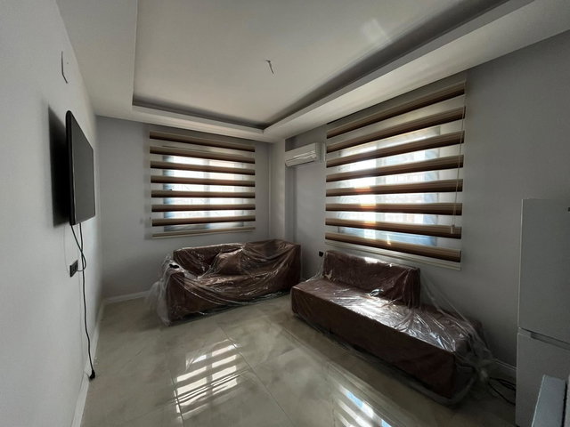 REMAX TOROS'TAN ÇİFTLİKKÖY'DE FULL SIFIR EŞYALI 2+1 BAHÇE KATI