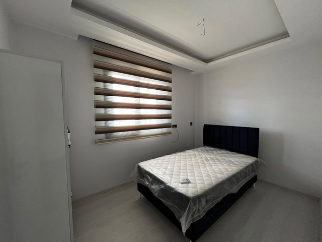 REMAX TOROS'TAN ÇİFTLİKKÖY'DE FULL SIFIR EŞYALI 2+1 BAHÇE KATI