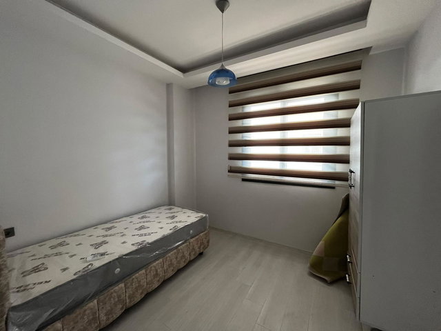 REMAX TOROS'TAN ÇİFTLİKKÖY'DE FULL SIFIR EŞYALI 2+1 BAHÇE KATI