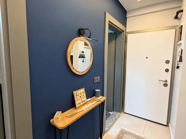 KUŞADASI EGE MAHALLESİ’NDE HAVUZLU SİTEDE OTOPARKLI MODERN DAİRE