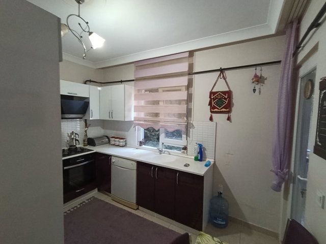 DENİZ MANZARALI LİLYUM 4 SİTESİ'NDE 50 M² ÖZEL BAHÇELİ