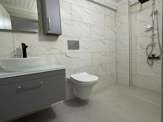 EFELER  MAHALLESİNDE  FULL TADİLATLI BAHÇE KATI 2+1 ÖN CEPHE SATILIK DAİRE