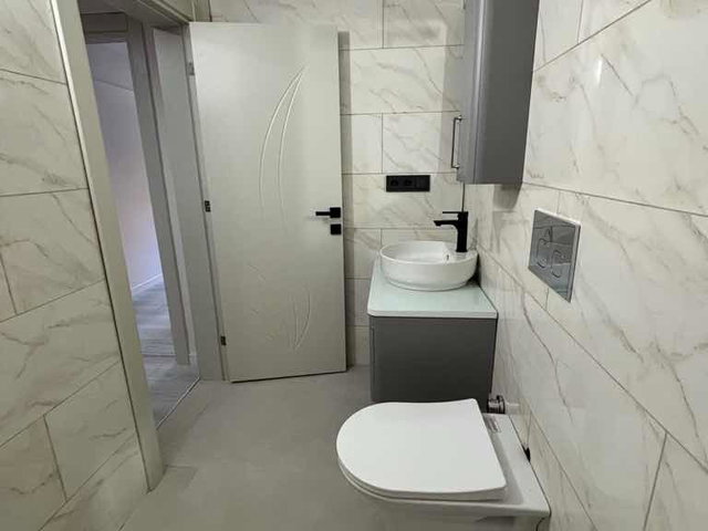 EFELER  MAHALLESİNDE  FULL TADİLATLI BAHÇE KATI 2+1 ÖN CEPHE SATILIK DAİRE