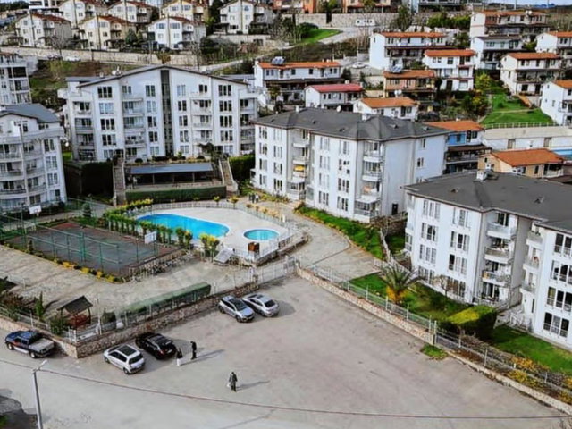GÜLAÇTI DENİZ KONAKLARINDA SATILIK DENİZ MANZARALI 2+1 DAİRE