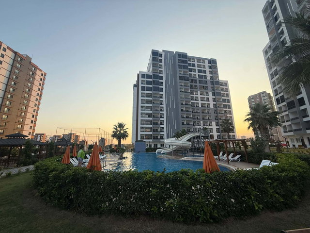 REMAX RİNA'DAN YAŞAR DOĞU ÜZERİNDE SOSYAL TESİSLİ 1+1