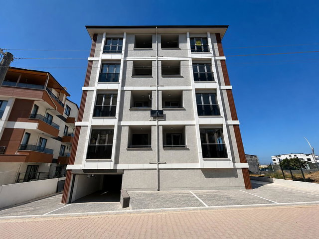 HASTANE VE SAHİLE YAKIN SIFIR 2+1 AÇIK-KAPALI OTOPARKLI DAİRE