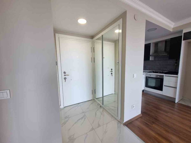 EDONİA GARDEN SİTESİNDE 1+1 KISMI DENİZ MANZARALI DAİRE