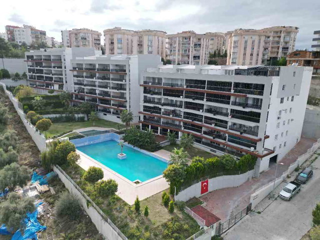 KUŞADASI’NDA EŞYALI 3+1 ÇİFT BANYO HAVUZLU DOĞALGAZLI KAPALI MUTFAKLI KİRALIK DAİRE