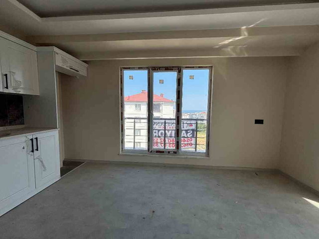ATAKUM KÖRFEZ DE SATILIK SIFIR 1+1 ARA KAT DAİRE