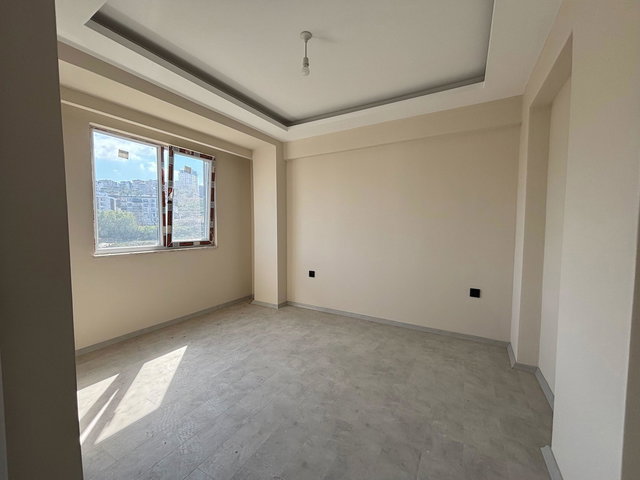 ATAKUM KÖRFEZ DE SATILIK SIFIR 1+1 ARA KAT DAİRE