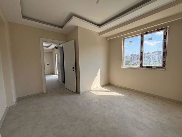 ATAKUM KÖRFEZ DE SATILIK SIFIR 1+1 ARA KAT DAİRE
