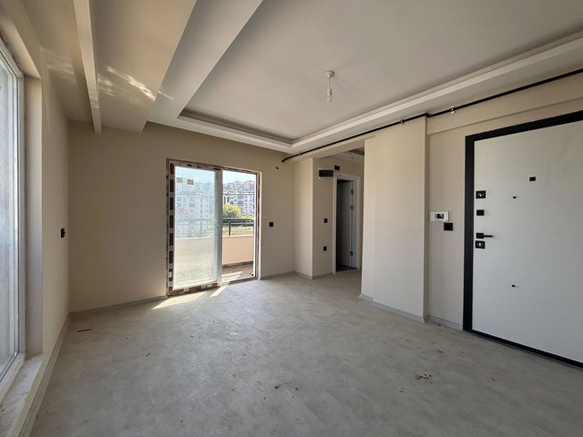 ATAKUM KÖRFEZ DE SATILIK SIFIR 1+1 ARA KAT DAİRE