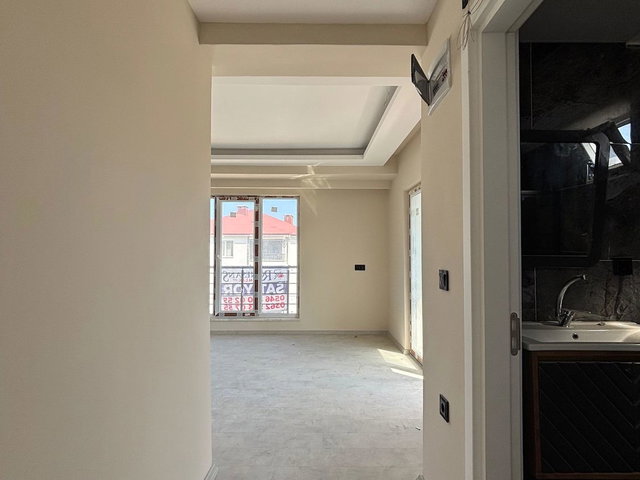 ATAKUM KÖRFEZ DE SATILIK SIFIR 1+1 ARA KAT DAİRE