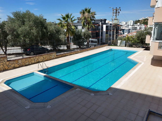 KUŞADASI EGE MAH’DE 3+1  150 M² BRÜT ÖNÜ AÇIK KAT MÜLKİYETLİ DAİRE